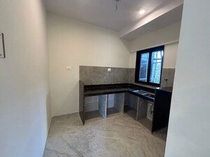 Kitchen in 2 BHK Apartment at Ajmera Boulevard, Malad West – for Sale