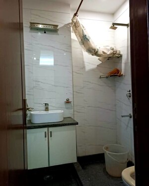 Bathroom in 3 BHK Builder Floor at East Of Kailash – for Sale