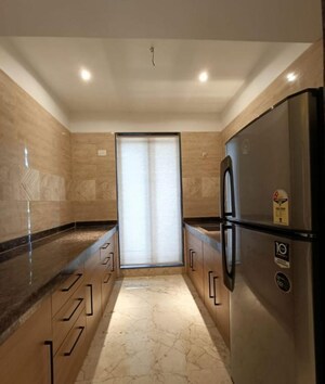 Kitchen in 1 BHK Apartment at Tharwani Vedant Millenia, Titwala – for Sale