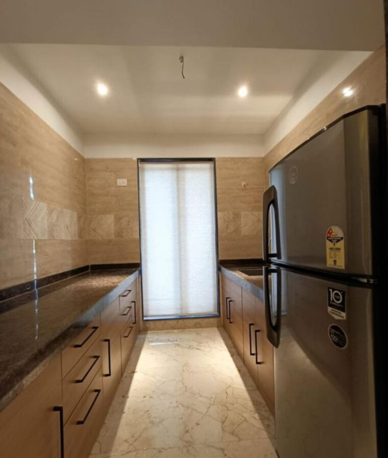 Kitchen, tharwani-vedant-millenia 1 Bedroom 465 Sq.Ft. Apartment In Titwala Thane 10595757