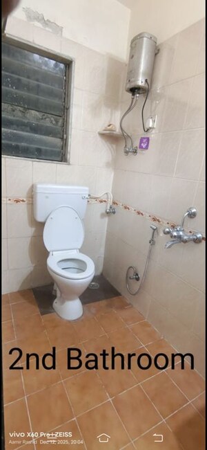 Bathroom in 2 BHK Apartment at Vedant Complex CHS, Samata Nagar – for Rent
