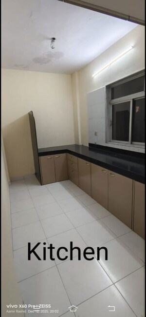 Kitchen in 2 BHK Apartment at Vedant Complex CHS, Samata Nagar – for Rent