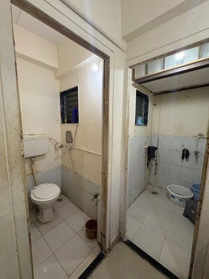 Bathroom in 1 BHK Apartment at OM Elegance, Malad West – for Rent