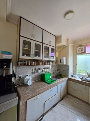 Kitchen in 3 BHK Apartment at DLF Oakwood Estate, Dlf Phase ii – for Rent