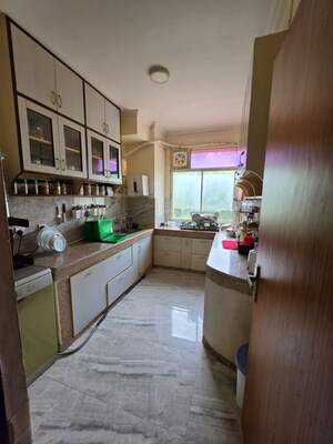 Kitchen in 3 BHK Apartment at DLF Oakwood Estate, Dlf Phase ii – for Rent