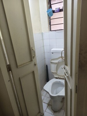 Bathroom in 1 BHK Apartment at Shriram Nagar CHS, Aundh – for Rent