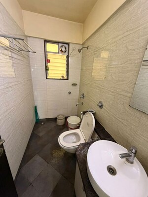 Bathroom in 3 BHK Apartment at Regency Cosmos, Baner – for Rent