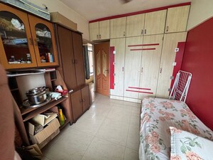 Living Room in 2 BHK Apartment at Satellite Garden, Goregaon East – for Rent