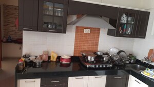 Kitchen in 2 BHK Apartment at Rahu Nisarg Society, Warje – for Sale