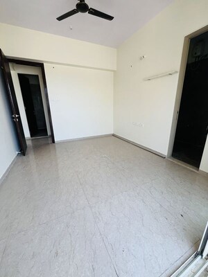 Room in 1 BHK Apartment at Satellite Garden, Goregaon East – for Rent