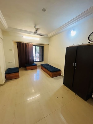 Living Room in 1 BHK Apartment at Satellite Garden, Goregaon East – for Rent