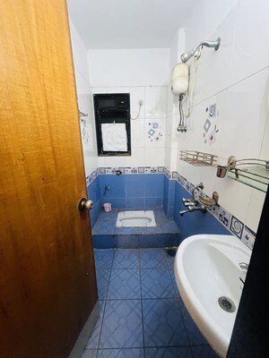 Bathroom in 1 BHK Apartment at Satellite Garden, Goregaon East – for Rent