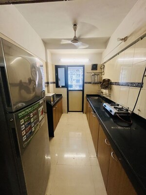 Kitchen in 1 BHK Apartment at Satellite Garden, Goregaon East – for Rent