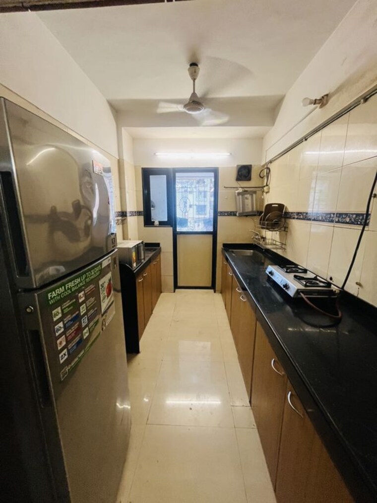 Kitchen, satellite-garden 1 Bedroom 425 Sq.Ft. Apartment In Goregaon East Mumbai 10582205