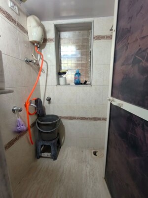 Bathroom in 2 BHK Apartment at Shreeji Atlantis, Malad West – for Sale