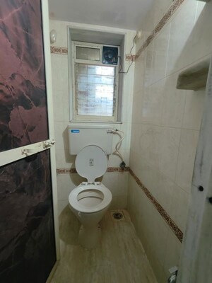 Bathroom in 2 BHK Apartment at Shreeji Atlantis, Malad West – for Sale