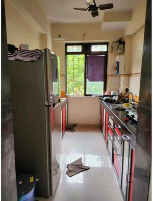 Kitchen in 2 BHK Apartment at Lodha Paradise, Majiwada – for Rent