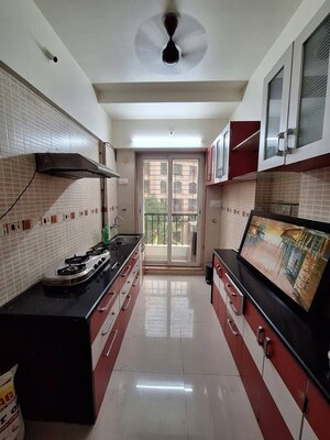 Kitchen in 2 BHK Apartment at Sheth Fiona, Pokhran Road No Two – for Rent