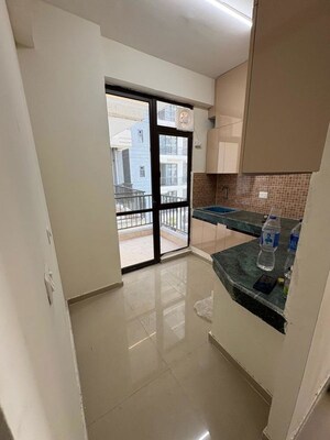 Kitchen in 2 BHK Apartment at ROF Aalayas, Sector 102 – for Sale