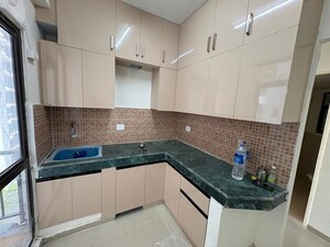 Kitchen in 2 BHK Apartment at ROF Aalayas, Sector 102 – for Sale