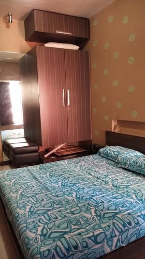 Bedroom in 2 BHK Apartment at Indradarshan II, Oshiwara – for Sale