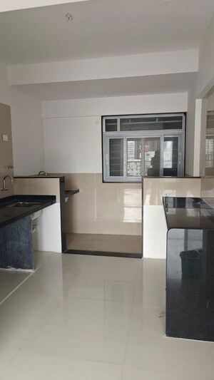 Kitchen in 3 BHK Apartment at Raga Top Towers, Wakad – for Rent