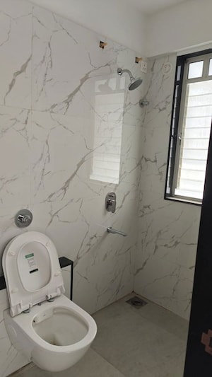 Bathroom in 3 BHK Apartment at Raga Top Towers, Wakad – for Rent