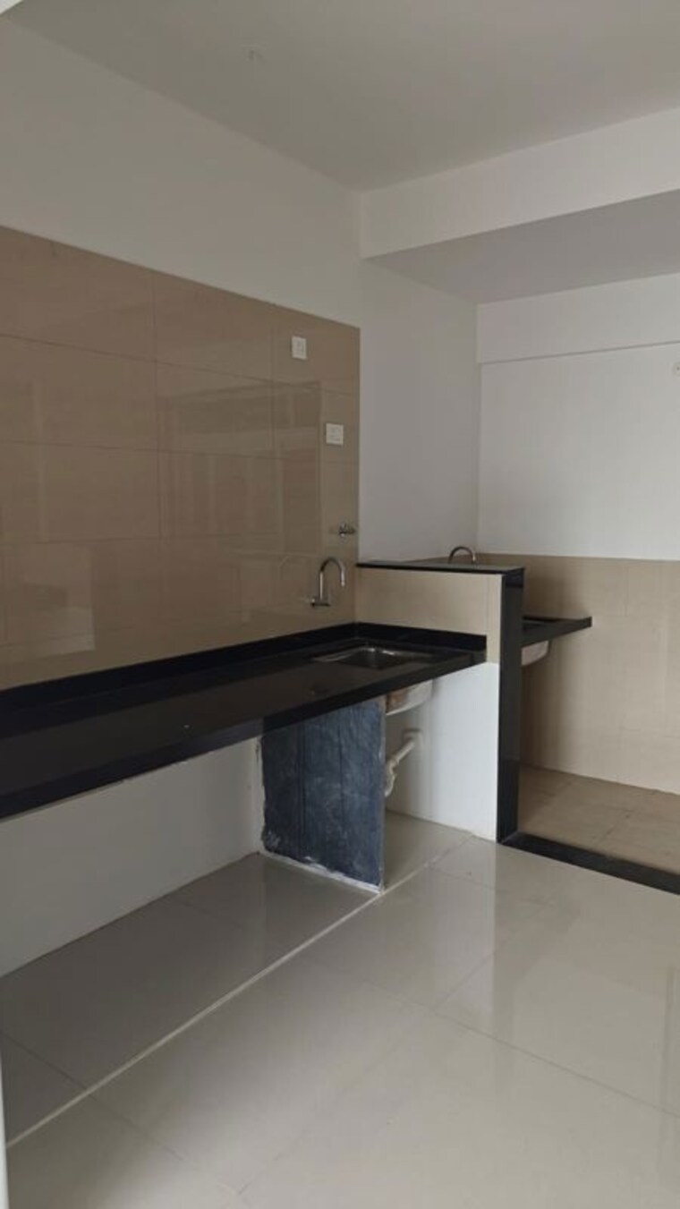 Kitchen, raga-top-towers 3 Bedroom 1100 Sq.Ft. Apartment In Wakad Pune 10596120