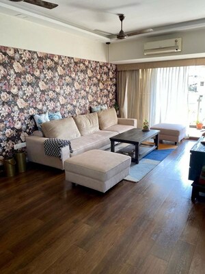 Living Room in 2 BHK Apartment at Rustomjee OZone, Goregaon West – for Sale