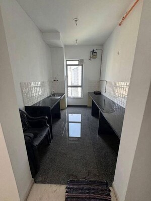 Kitchen in 2 BHK Apartment at Lodha Luxuria Priva, Majiwada – for Sale