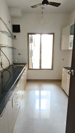 Kitchen in 2.5 BHK Apartment at Oberoi Realty Woods, Goregaon East – for Rent