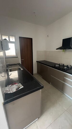 Kitchen in 3 BHK Apartment at Gera Planet Of Joy, Kharadi – for Rent