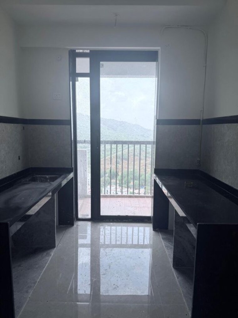 Kitchen, dosti-west-county-phase-2-dosti-cedar 2 Bedroom 900 Sq.Ft. Apartment In Balkum Pada Thane 10595847