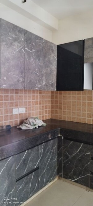 Kitchen in  Apartment at Mahagun My Woods, Sector 16c Greater Noida – for Rent