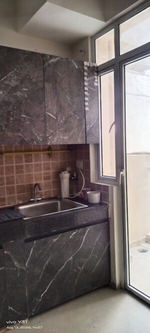 Kitchen in  Apartment at Mahagun My Woods, Sector 16c Greater Noida – for Rent