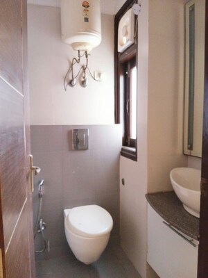 Bathroom in 3 BHK Builder Floor at Chittaranjan Park – for Rent
