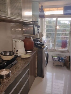 Kitchen in 3 BHK Apartment at Group Seven Rushi Heights, Goregaon East – for Rent