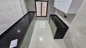 Kitchen in 3 BHK Apartment at Poonam Vaishno Heights, Malad East – for Rent