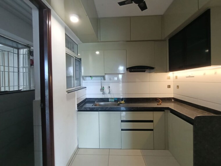 Kitchen, bk-jhala-simpli-city-phase-ii 2.5 Bedroom 1100 Sq.Ft. Apartment In Handewadi Pune 10596366