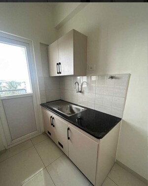 Kitchen in 2 BHK Apartment at Provident Neora, Thanisandra Main Road – for Rent