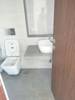Bathroom in 1 BHK Apartment at Omkar Signet, Malad East – for Rent