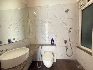 Bathroom in 3 BHK Apartment at Omkar Alta Monte, Malad East – for Rent