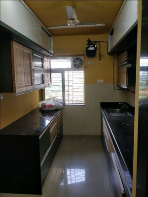 Kitchen in 2 BHK Apartment at Kalpataru Hills, Manpada – for Rent