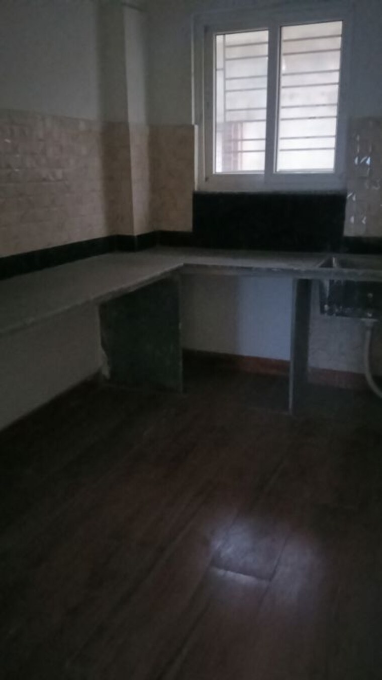 Kitchen, sun-aa1325 3 Bedroom 1020 Sq.Ft. Apartment In New Town Kolkata 10596459