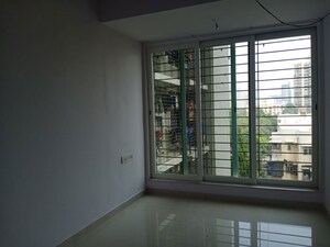 Room in 2 BHK Apartment at DLH Orchid, Andheri West – for Sale