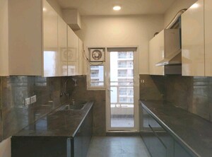Kitchen in 3 BHK Apartment at Elite Golf Green, Sector 79 – for Rent