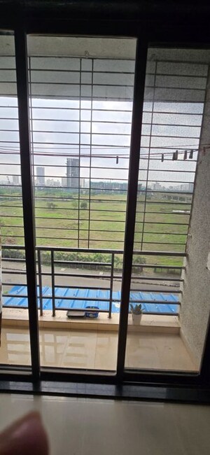 Room in 2 BHK Apartment at Maxim Central, Kharghar – for Rent