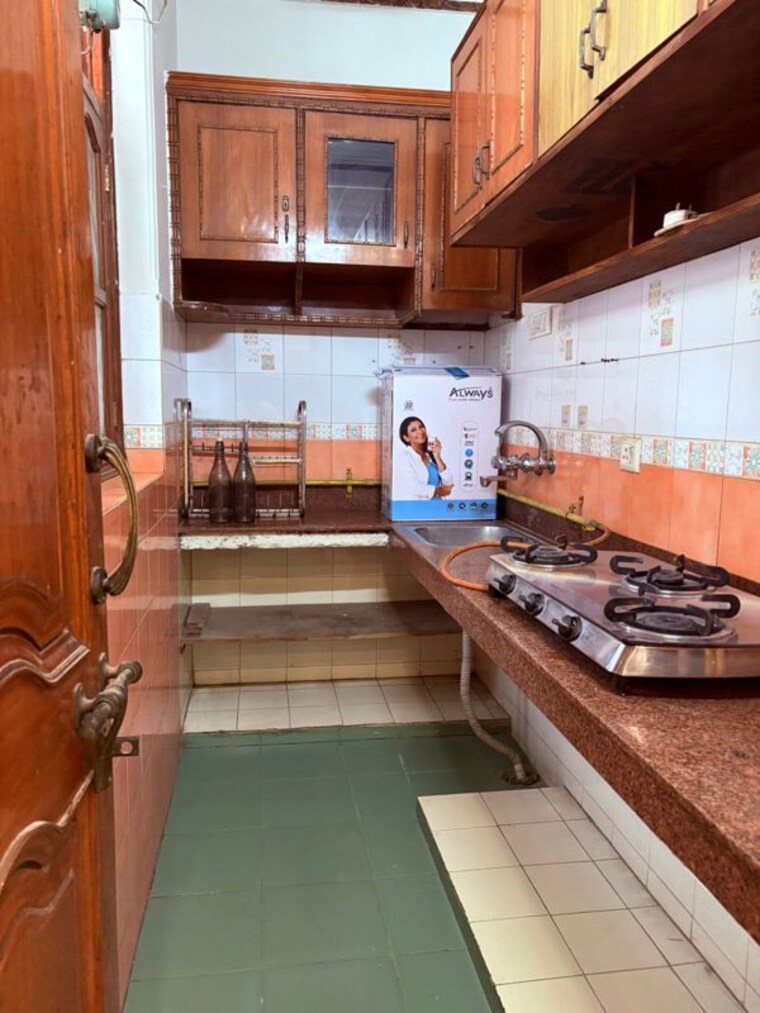 Kitchen, ansal-plaza-sector-23 1 Bedroom 800 Sq.Yd. Apartment In Sector 23 Gurgaon 10596541