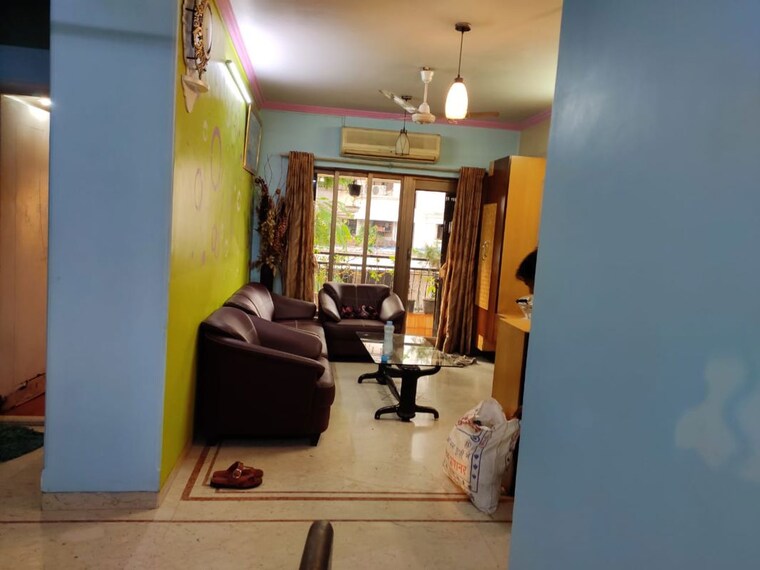Living Room, lokhandwala complex 2 Bedroom 850 Sq.Ft. Apartment In Lokhandwala Complex Mumbai 10596579