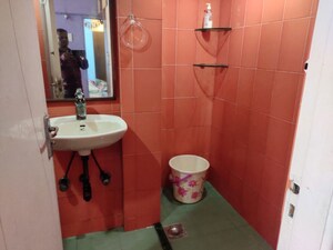 Bathroom in 2 BHK Apartment at Lokhandwala Complex – for Rent
